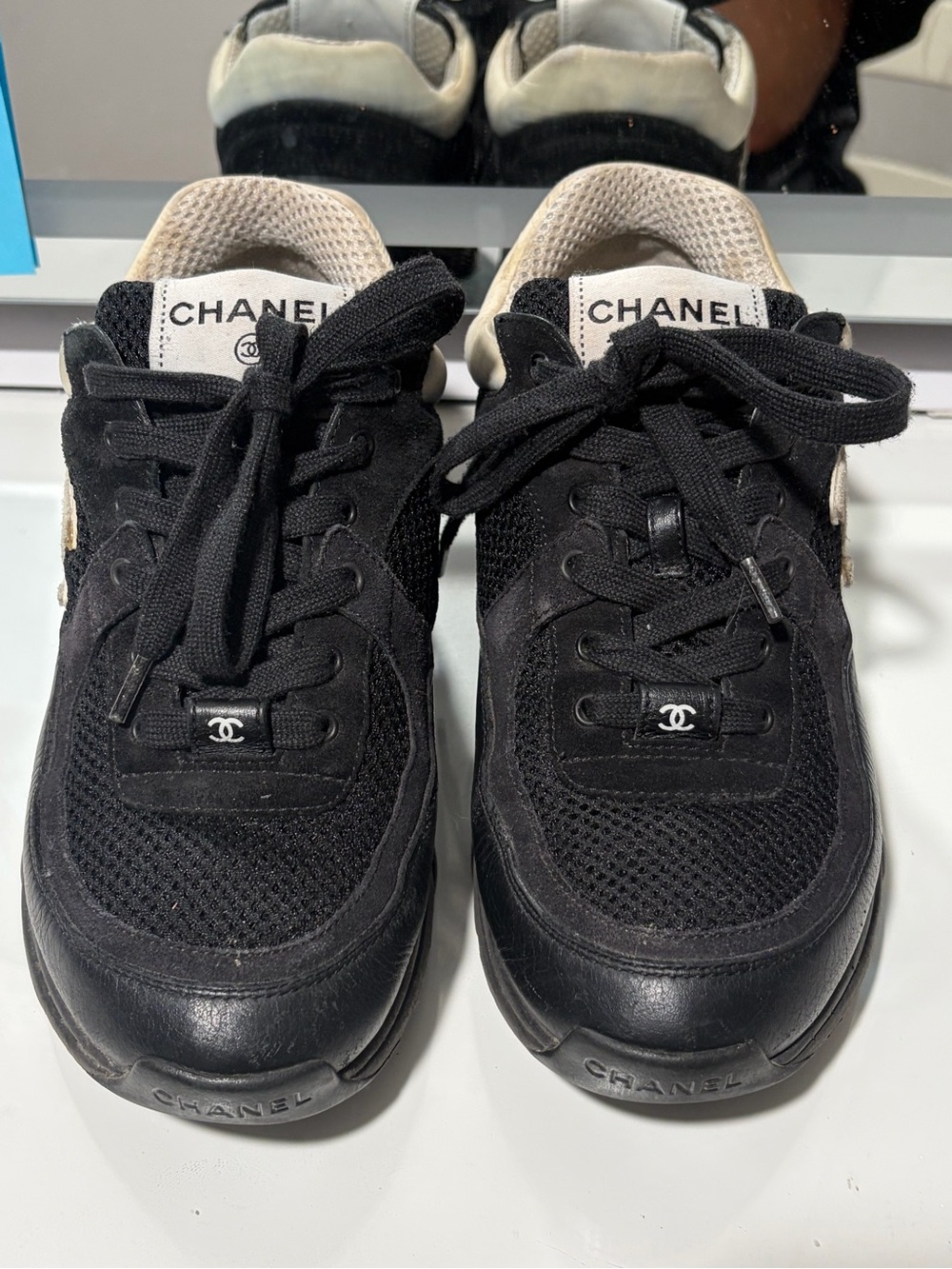 CHANEL Black and Cream Sneakers